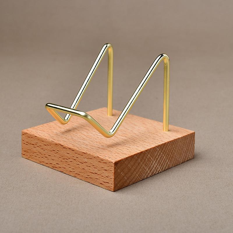 "Heart-Shaped Crystal Mineral Specimen On Iron Stand with Wooden Jewelry Display"