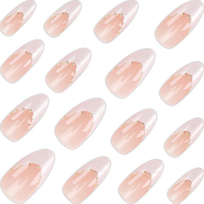 The Finished Product Of Wearing Nail Pieces Is A Dreamy French Gilded Nude Pink Korean Style High-end Almond Manicure.
