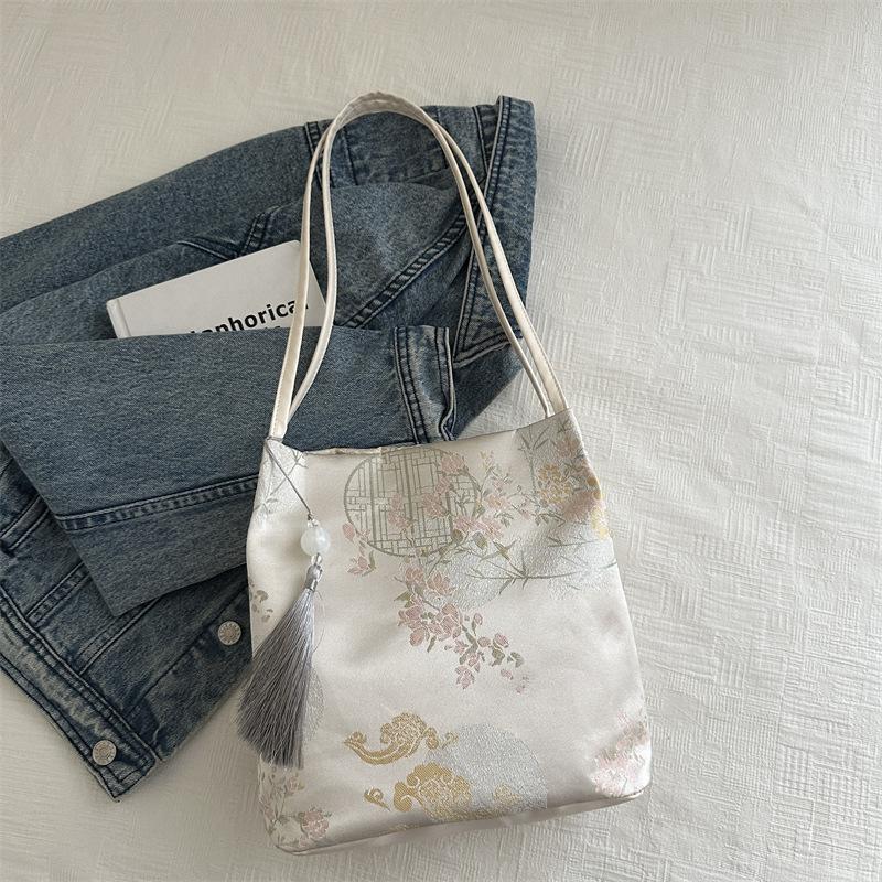 Новая китайская сумочка, новая красивая сумка через плечо для женщин, персонализированная повседневная женская ручная сумка-ведро с текстурой