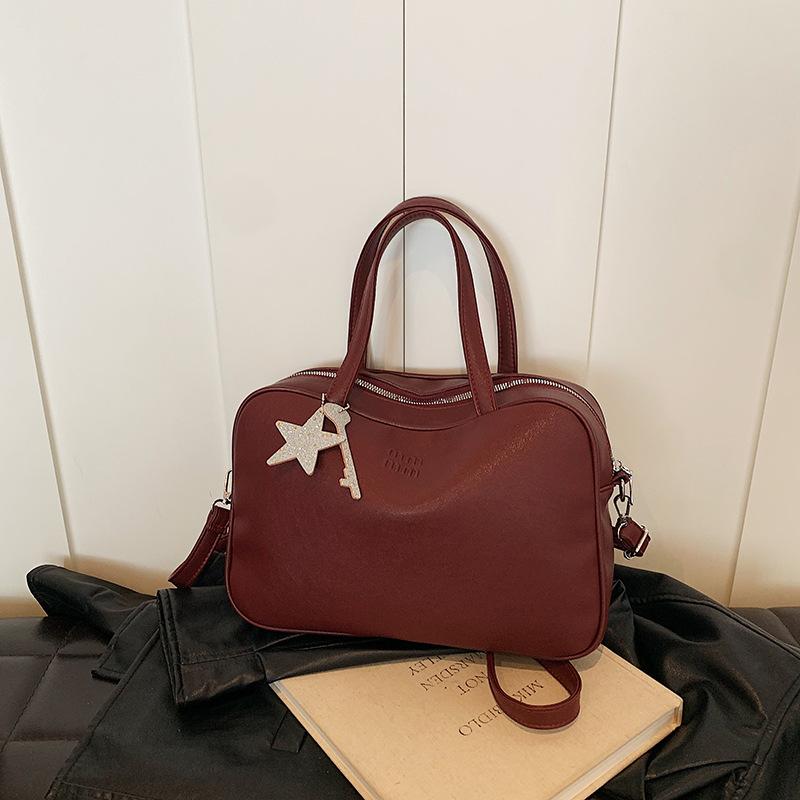 Простая ручная сумка в стиле ретро, портативная сумка для поездок на работу, новая нишевая сумка-подушка высокого класса, вместительная женская сумка