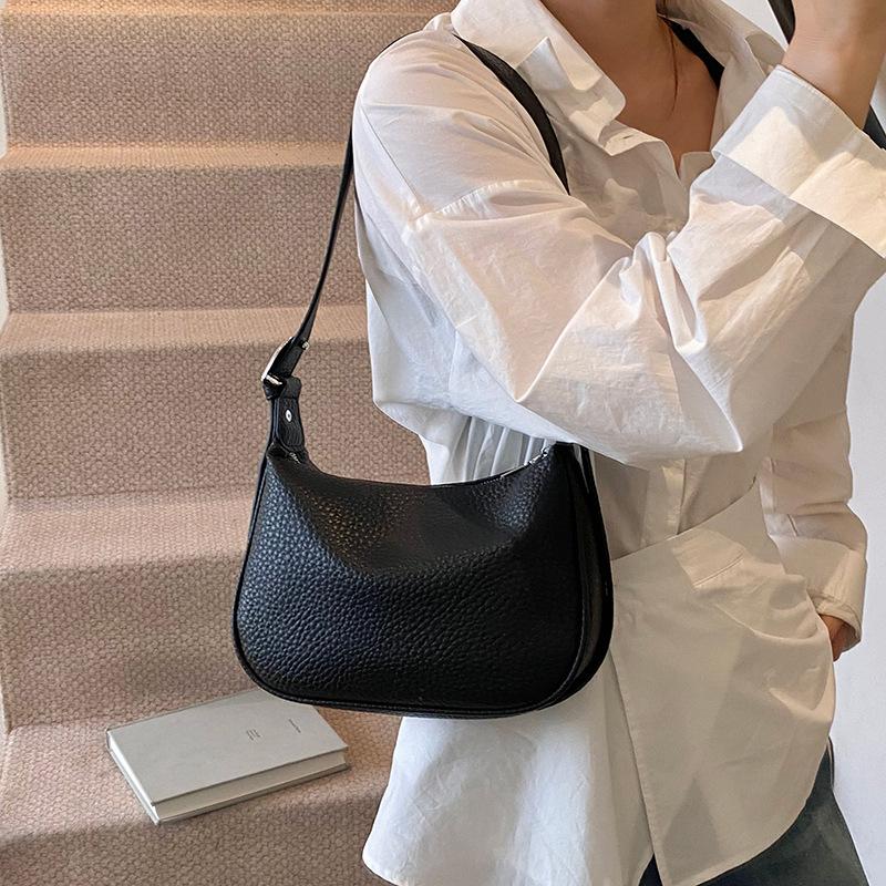 Супер огненная нишевая сумка-рожок женская 2025 новая весна и лето универсальная сумка-мессенджер модная на плечо подмышку сумка-пельмень