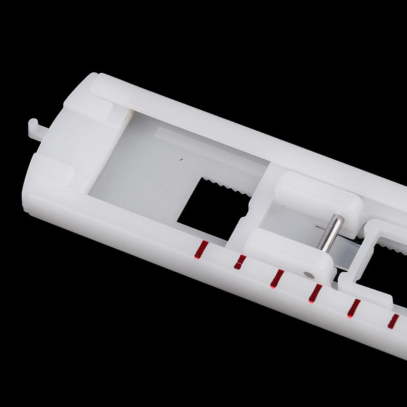 Детали швейной машины Singer. Петля прижимной лапки. Кнопка на отверстии для пуговицы.