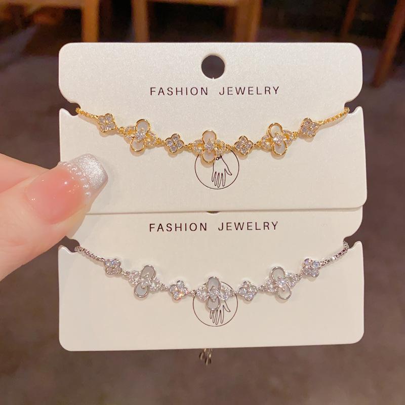 Exquisite Vintage Fashionable Luxurious Zircon Four-Leaf Flower Pull-Out Bracelet Simple Elegant Unique Design Women's Gift.
