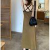 Temperament contrasting backless knitted suspender dress women's spring Korean version of the new waist and thin medium and long A-shaped skirt