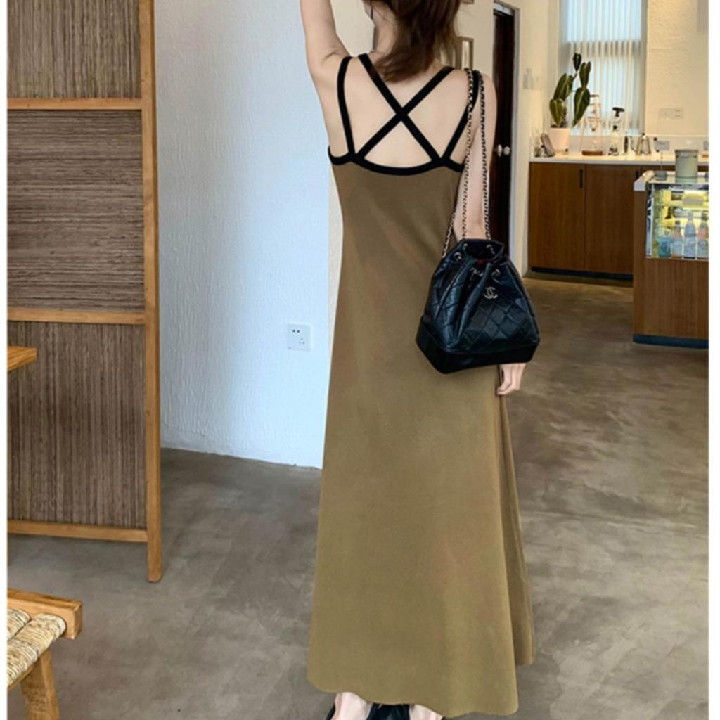 Temperament contrasting backless knitted suspender dress women's spring Korean version of the new waist and thin medium and long A-shaped skirt