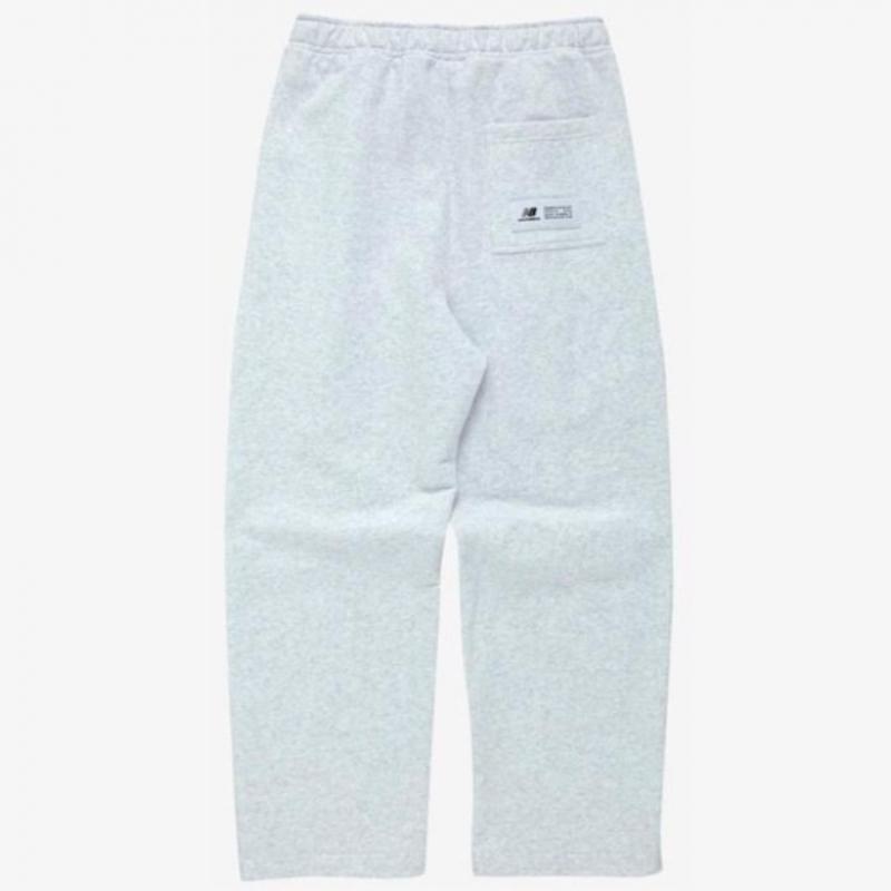 New Balance Спортивные брюки Uni One Tuck Wide Nbmld13143 16