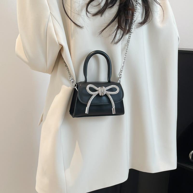 Французский нишевый дизайн премиум мини-сумка 2025 для девочки с бантом, цепочкой, для помады, наушников, сумка-мессенджер, тренд