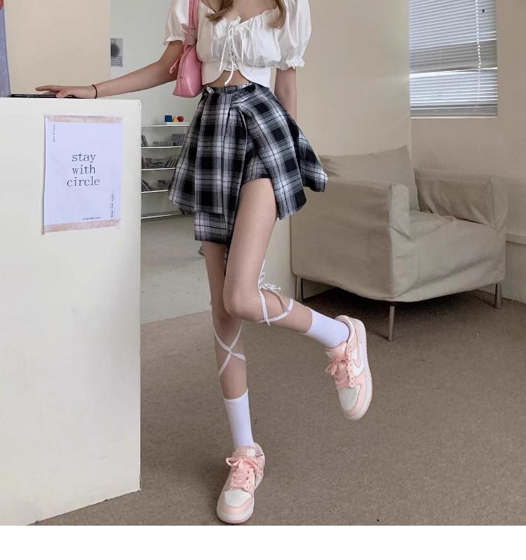 Женская черная клетчатая юбка-шорты А-силуэта 2025 года с асимметричным дизайном из двух частей