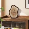 Clock with an irregular wood grain pattern; silent operation. Suitable as living room decor or as a tabletop clock (battery included).