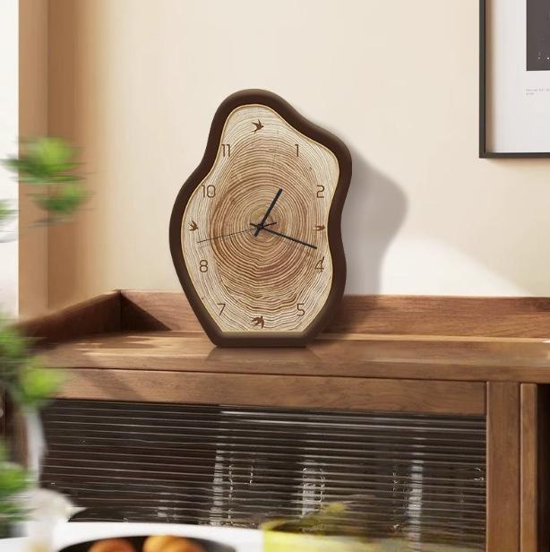 Clock with an irregular wood grain pattern; silent operation. Suitable as living room decor or as a tabletop clock (battery included).