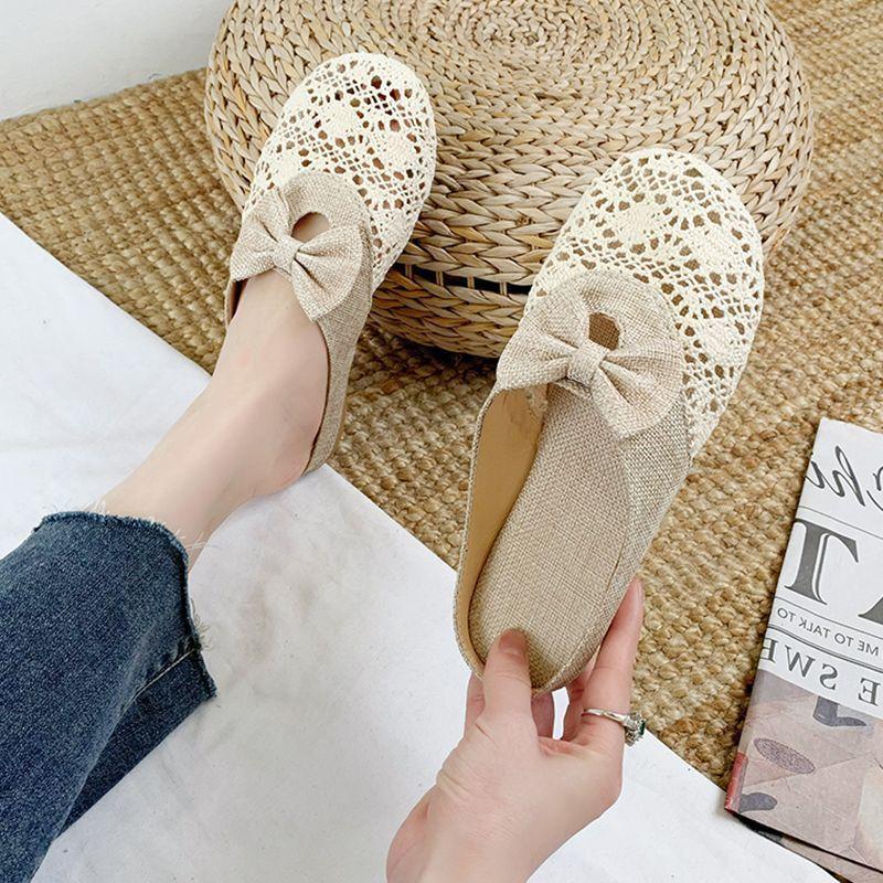 2025 spring and summer new bow baotou slippers women's half slippers temperament flat bottom breathable woven hollow sandals