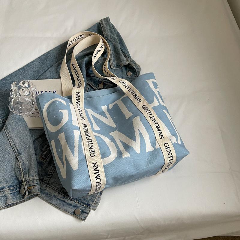 2025 Модная холщовая сумка Ленивый ветер Японская Большая вместимость Студенческая холщовая сумка Ремешок с алфавитом Сумка-тоут