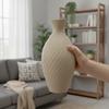 Decorative vase in the shape of a jug, beige, for flowers, elegant design