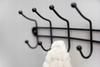 Wall-Mounted Hanger for Clothes