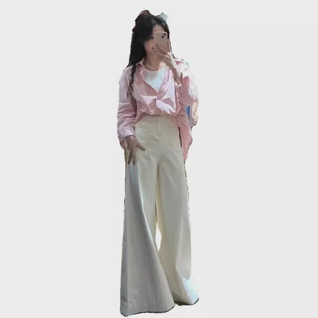 Женские светло-голубые джинсы с высокой талией и широкими штанинами - Коллекция Весна/Лето 2024 