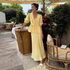 Women's Yellow V-Neck Bubble Sleeve Top with Ruffle Detail and Matching Long Skirt Set