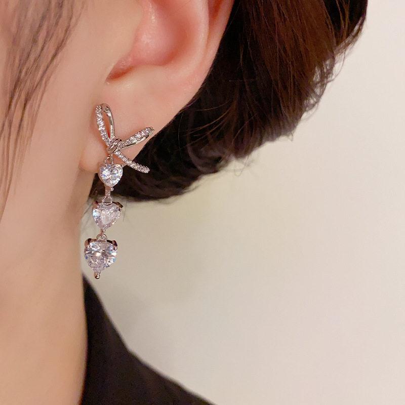 Copper-plated real gold trend bow zircon love earrings s911 silver needle fashion light luxury high-end temperament earrings