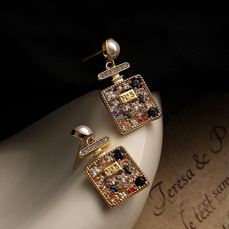 Роскошные серьги-подвески с жемчугом: Шикарный летний отпускной стиль 2025 для женщин