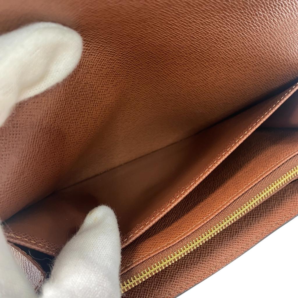 Подержанный кошелек LOUIS VUITTON Коричневый ПВХ Женский