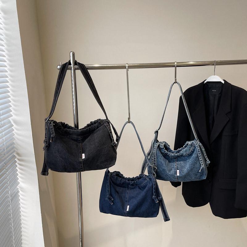 Urban Minimalist Denim Shoulder Bag With Drawstring Switch And Soft Construction For Everyday