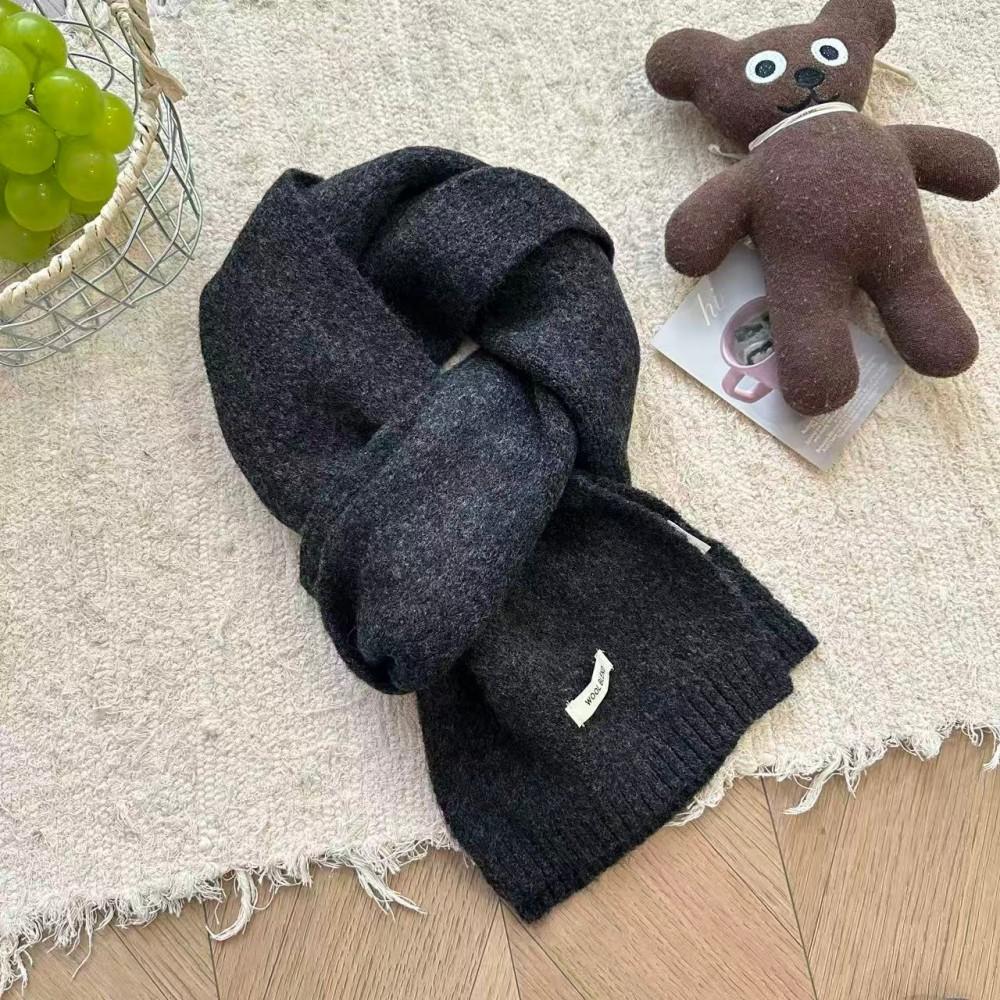 Solid color versatile wool blended knitted scarf women's autumn and winter atmosphere white soft waxy student wool scarf manufacturer