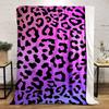 Leopard print pattern on a pink and purple gradient background. for all seasons blanket lunch break throw gift