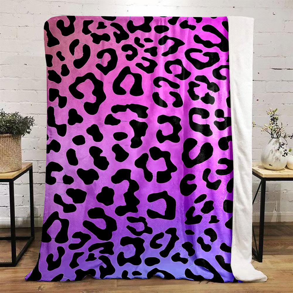 Leopard print pattern on a pink and purple gradient background. for all seasons blanket lunch break throw gift