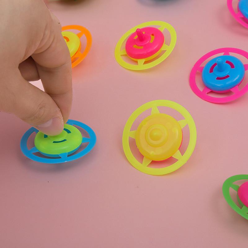 Plastic Spin Gyroscope Toy For Children With Colorful Candy Design And Traditional Play Use