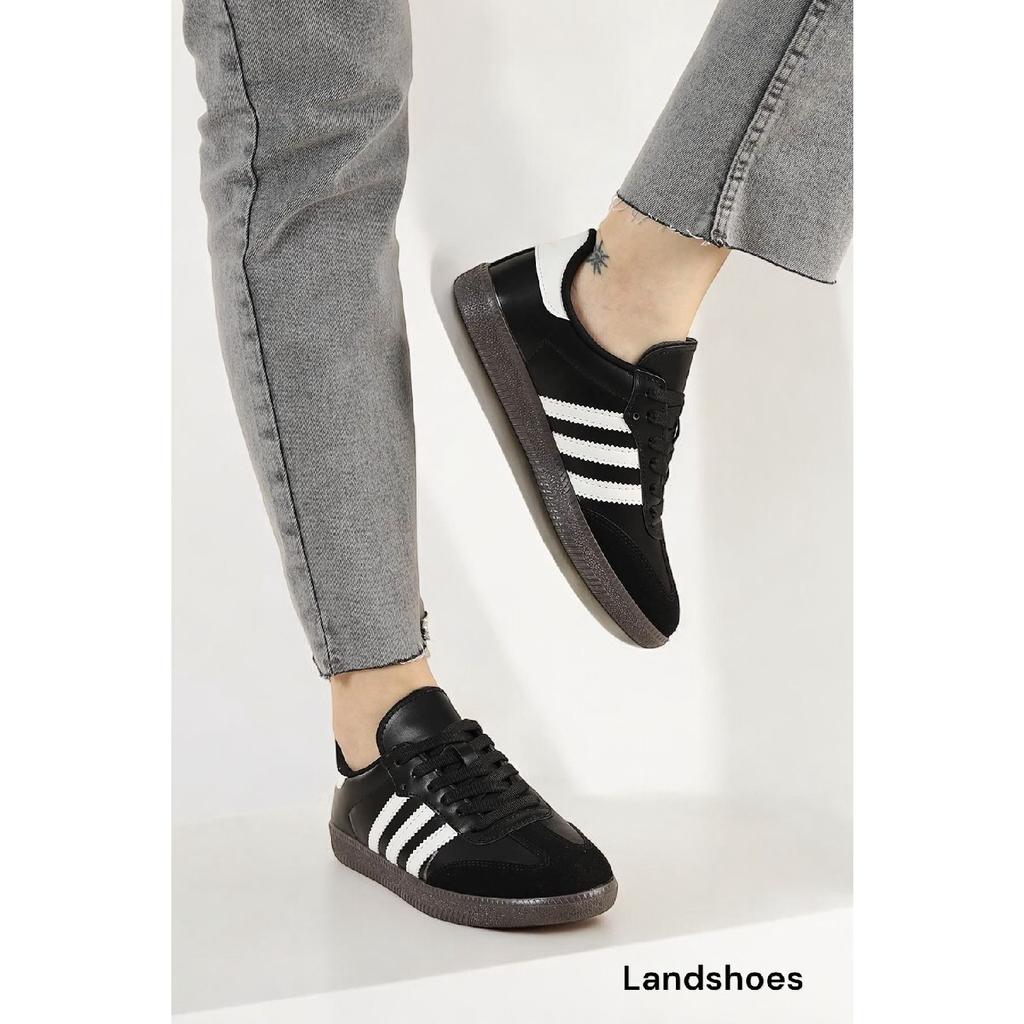 Бело-черные спортивные туфли унисекс в полоску на плоской подошве со шнуровкой