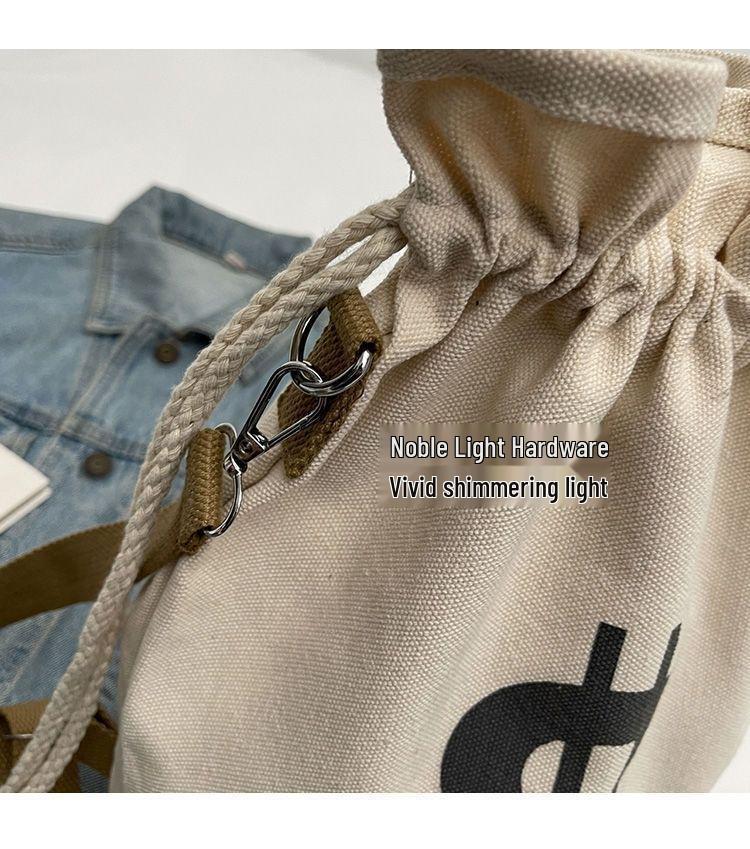 Women's Large Capacity Canvas Drawstring Backpack: Multifunctional, Fashionable, Versatile Single Shoulder & Crossbody Bucket Bag