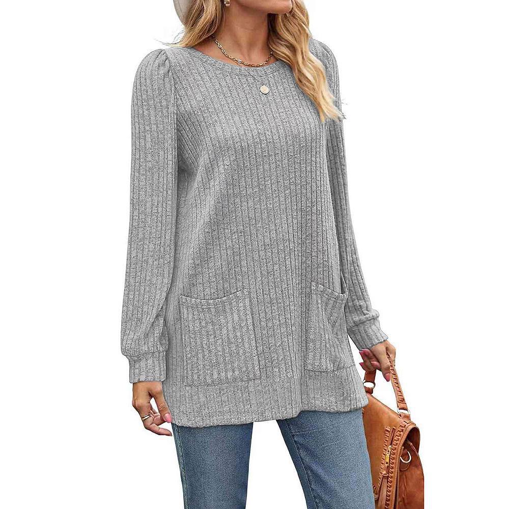 Женский вязаный свитер средней длины с карманами — однотонный, в рубчик, с круглым вырезом на осень/зиму 2024 г.