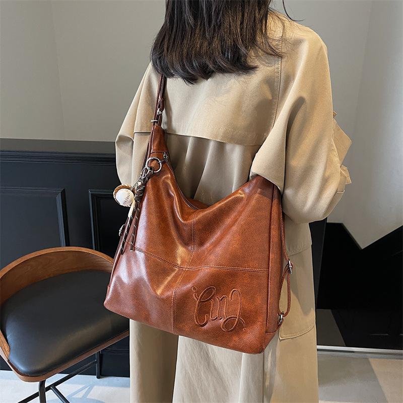 European and American Retro Tote Bag 2025 New Women's Shoulder Messenger Bag Backpack Fashionable and Simple Women's Bag