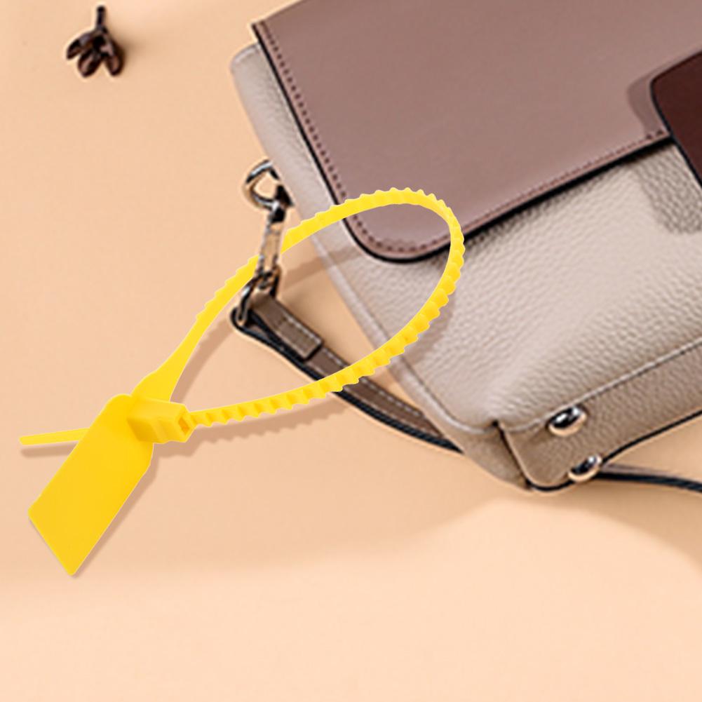 100 шт. Пластиковые одноразовые стяжки-застежки-молнии самоблокирующиеся стяжки для чемодана, обуви, сумки, этикетки, бирки (желтый)