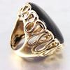 Позолоченное кольцо с ониксом "Oracle"