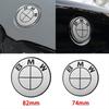 7 новых эмблем BMW логотипы на перед и зад 82 мм 74 мм 4 колпака на диски 68 мм + 4 наклейки на руль полный комплект эмблем для автомобиля.