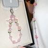 Peach blossom flash messenger mobile phone chain light luxury high-end crystal hanging chain fashionable anti-drop hand carry pendant female beads