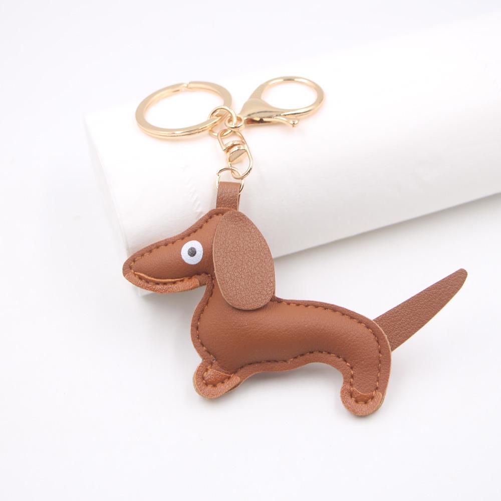 В наличии Кожаный шарм с мультяшным изображением таксы, Брелок для ключей с собакой и Аксессуар для чехла телефона