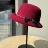 Новая шляпа-рыбачка из серой шерсти с бантом в стиле Цяньцзинь для женщин на осень и зиму, маленькая шляпка-цилиндр, подчеркивающая темперамент, шляпа-ведро