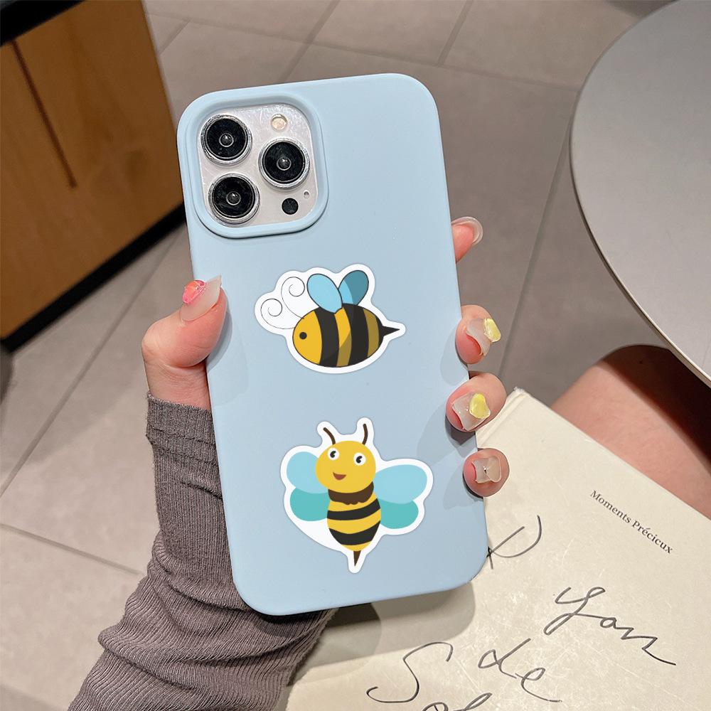 60 Cartoon Bee Stickers: Cute, Waterproof Insect Designs for DIY Decoration on Suitcases and Helmets.