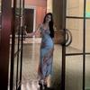 Sanya seaside vacation suspender dress cardigan two-piece set women's new French temperament hip beach skirt long dress