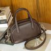 Винтажная женская сумка-боулинг Boston Bowling Bag из натуральной кожи растительного дубления Niche с одним плечом и через плечо