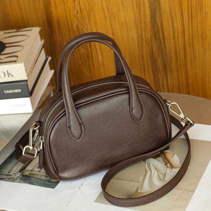 Винтажная женская сумка-боулинг Boston Bowling Bag из натуральной кожи растительного дубления Niche с одним плечом и через плечо
