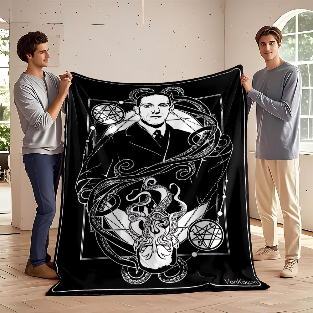 A symmetrical design features a man, tentacles, symbols, and geometric shapes. for all seasons blanket lunch break throw gift