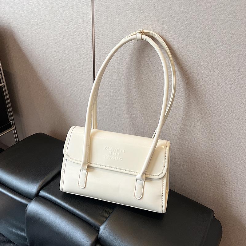 Сумка большой вместимости женская весна-лето 2025 новая нишевая дизайнерская сумка на плечо подмышку корейская версия женская сумка-тоут для поездок на работу