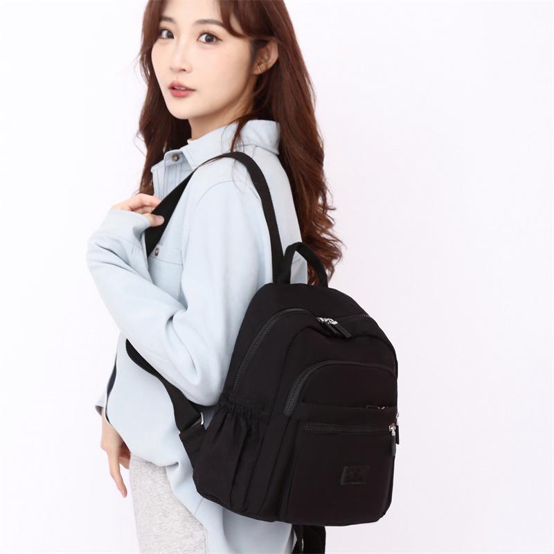 Stylish Washed Cloth Lightweight Women's Backpack – Essential for Casual Travel, Large Capacity, New Style and Hot-Selling.