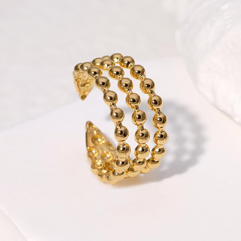 Открытое кольцо из нержавеющей стали с покрытием из 18-каратного золота: Простой, универсальный, нишевый дизайн, стойкий к выцветанию титановый стальной корпус.