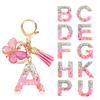 Pink Epoxy Letter Keychain with Sequin Butterfly & Tassel Charm