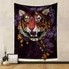 A fierce tiger's face adorned with purple flowers and hanging ornaments. Patterned tapestry for bedroom and living room home decor