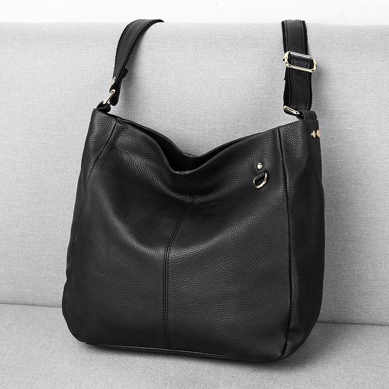 Первый слой коровьей кожи от Feiya — простой и модный, а вместительная сумка-ведро выполнена из мягкой кожи с одним плечом и сумкой через плечо.