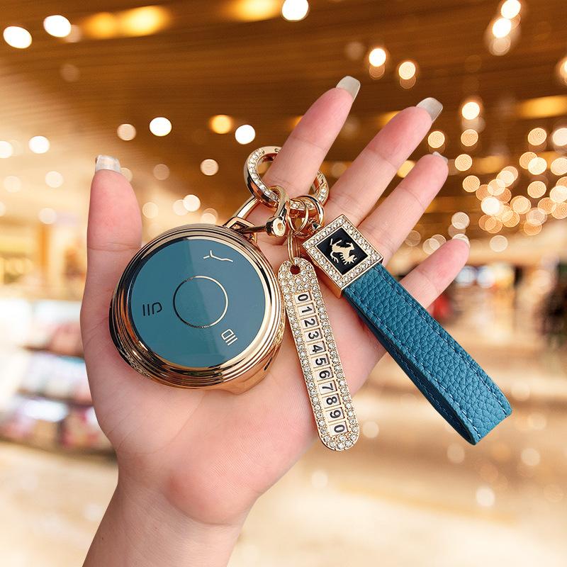 Подходит для автомобиля Nezha V, сумка для набора ключей Nezha U Pro, защита высокого класса, персонализированная пряжка против падения, корпус для новой энергии для мужчин и женщин